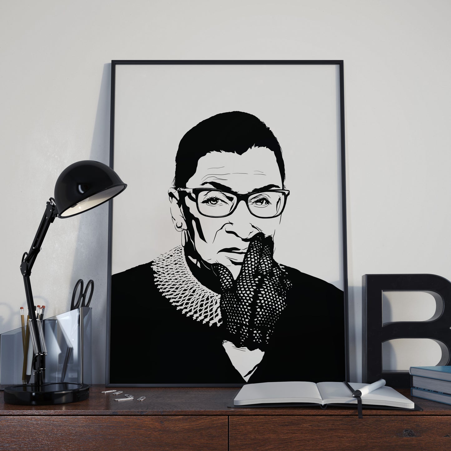 black and white digital illustration portrait of ruth bader ginsburg with lace glove framed print