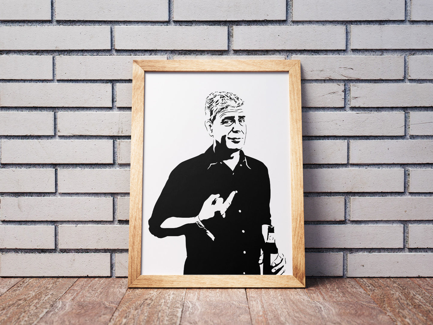 black and white digital illustration of anthony bourdain drinking a beer and flipping his middle finger framed art print
