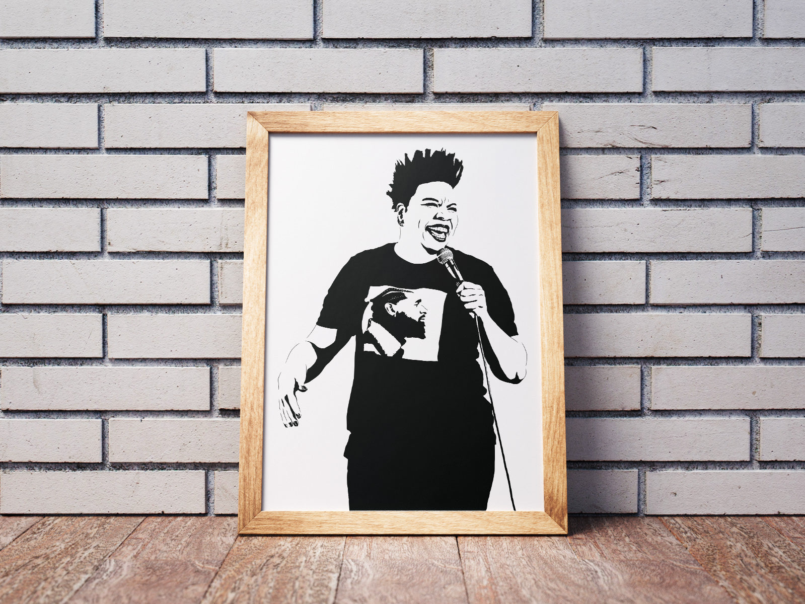 Black and white digital illustration of Leslie Jones performing stand-up, mid-punchline with the microphone raised framed print on floor